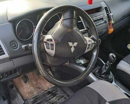 Белый Мицубиси Аутлендер, объемом двигателя 1.97 л и пробегом 270 тыс. км за 10850 $, фото 13 на Automoto.ua