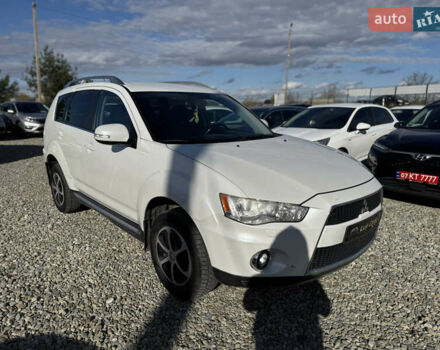 Белый Мицубиси Аутлендер, объемом двигателя 2.18 л и пробегом 271 тыс. км за 8700 $, фото 1 на Automoto.ua