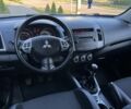 Білий Міцубісі Аутлендер, об'ємом двигуна 2.3 л та пробігом 234 тис. км за 10400 $, фото 7 на Automoto.ua