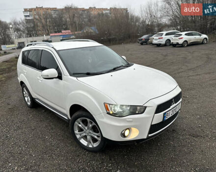Белый Мицубиси Аутлендер, объемом двигателя 2.2 л и пробегом 266 тыс. км за 9300 $, фото 1 на Automoto.ua