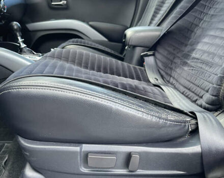 Білий Міцубісі Аутлендер, об'ємом двигуна 2.18 л та пробігом 198 тис. км за 11500 $, фото 33 на Automoto.ua