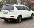 Белый Мицубиси Аутлендер, объемом двигателя 2.36 л и пробегом 260 тыс. км за 10000 $, фото 2 на Automoto.ua