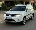 Белый Мицубиси Аутлендер, объемом двигателя 3 л и пробегом 224 тыс. км за 10600 $, фото 1 на Automoto.ua