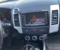 Білий Міцубісі Аутлендер, об'ємом двигуна 2.2 л та пробігом 260 тис. км за 11000 $, фото 14 на Automoto.ua