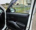 Білий Міцубісі Аутлендер, об'ємом двигуна 2.27 л та пробігом 243 тис. км за 9800 $, фото 27 на Automoto.ua