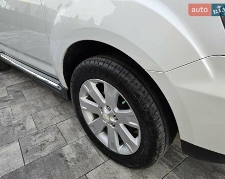 Білий Міцубісі Аутлендер, об'ємом двигуна 2.36 л та пробігом 178 тис. км за 10200 $, фото 49 на Automoto.ua