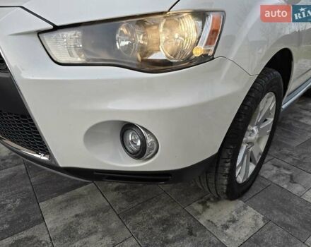 Білий Міцубісі Аутлендер, об'ємом двигуна 2.36 л та пробігом 178 тис. км за 10200 $, фото 45 на Automoto.ua