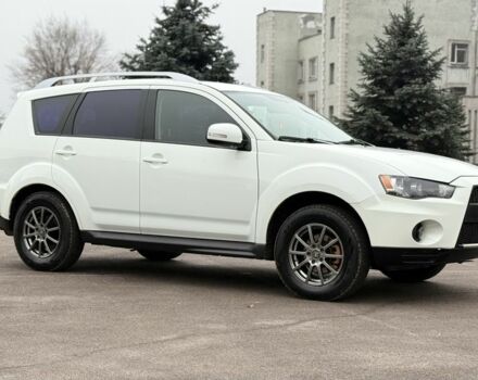 Білий Міцубісі Аутлендер, об'ємом двигуна 2.4 л та пробігом 250 тис. км за 10000 $, фото 1 на Automoto.ua