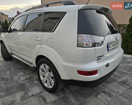 Білий Міцубісі Аутлендер, об'ємом двигуна 2.36 л та пробігом 178 тис. км за 10200 $, фото 70 на Automoto.ua