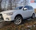 Белый Мицубиси Аутлендер, объемом двигателя 1.97 л и пробегом 270 тыс. км за 10850 $, фото 1 на Automoto.ua
