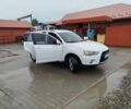 Белый Мицубиси Аутлендер, объемом двигателя 2.4 л и пробегом 283 тыс. км за 9500 $, фото 1 на Automoto.ua