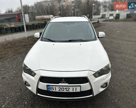 Белый Мицубиси Аутлендер, объемом двигателя 2.2 л и пробегом 266 тыс. км за 9300 $, фото 6 на Automoto.ua