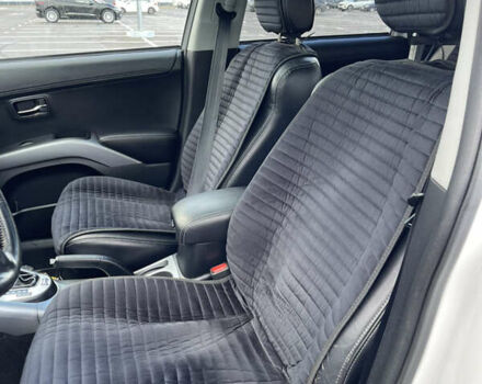 Білий Міцубісі Аутлендер, об'ємом двигуна 2.18 л та пробігом 198 тис. км за 11500 $, фото 32 на Automoto.ua