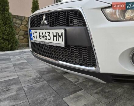 Білий Міцубісі Аутлендер, об'ємом двигуна 2.36 л та пробігом 178 тис. км за 10200 $, фото 46 на Automoto.ua