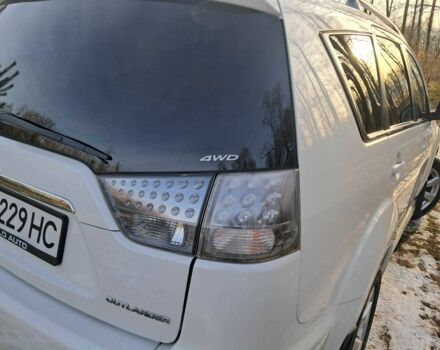 Білий Міцубісі Аутлендер, об'ємом двигуна 2 л та пробігом 270 тис. км за 10850 $, фото 5 на Automoto.ua