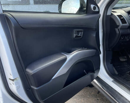 Білий Міцубісі Аутлендер, об'ємом двигуна 2.18 л та пробігом 198 тис. км за 11500 $, фото 34 на Automoto.ua