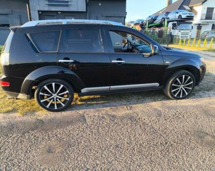 Белый Мицубиси Аутлендер, объемом двигателя 2 л и пробегом 170 тыс. км за 3744 $, фото 6 на Automoto.ua