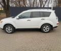 Білий Міцубісі Аутлендер, об'ємом двигуна 2 л та пробігом 240 тис. км за 5900 $, фото 1 на Automoto.ua