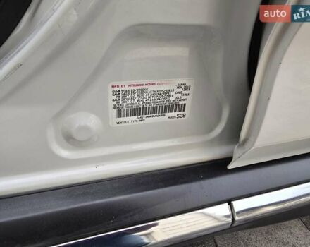 Білий Міцубісі Аутлендер, об'ємом двигуна 2.36 л та пробігом 178 тис. км за 10200 $, фото 22 на Automoto.ua