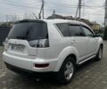Белый Мицубиси Аутлендер, объемом двигателя 2.3 л и пробегом 257 тыс. км за 10300 $, фото 2 на Automoto.ua