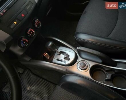 Білий Міцубісі Аутлендер, об'ємом двигуна 2.36 л та пробігом 178 тис. км за 10200 $, фото 20 на Automoto.ua