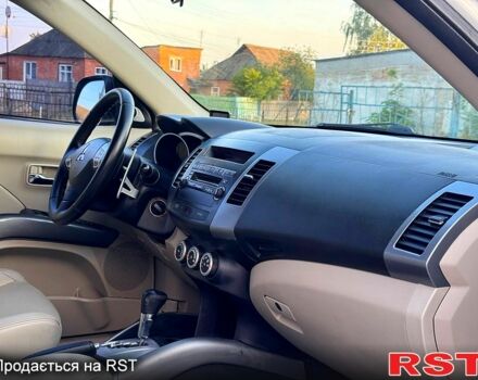 Білий Міцубісі Аутлендер, об'ємом двигуна 2.4 л та пробігом 173 тис. км за 9450 $, фото 5 на Automoto.ua