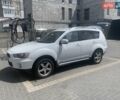 Белый Мицубиси Аутлендер, объемом двигателя 2 л и пробегом 190 тыс. км за 9800 $, фото 1 на Automoto.ua