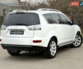 Белый Мицубиси Аутлендер, объемом двигателя 2.18 л и пробегом 227 тыс. км за 9999 $, фото 4 на Automoto.ua