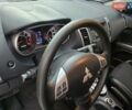 Білий Міцубісі Аутлендер, об'ємом двигуна 2.36 л та пробігом 178 тис. км за 10200 $, фото 17 на Automoto.ua