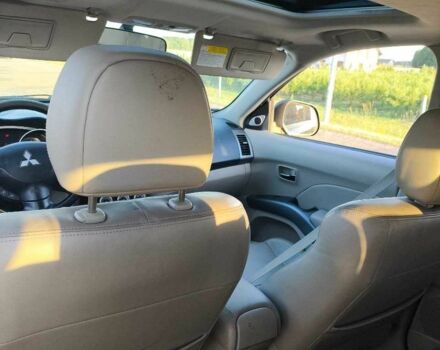 Белый Мицубиси Аутлендер, объемом двигателя 2 л и пробегом 170 тыс. км за 3744 $, фото 10 на Automoto.ua