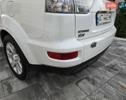 Білий Міцубісі Аутлендер, об'ємом двигуна 2.36 л та пробігом 178 тис. км за 10200 $, фото 61 на Automoto.ua