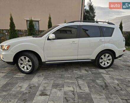 Білий Міцубісі Аутлендер, об'ємом двигуна 2.36 л та пробігом 178 тис. км за 10200 $, фото 69 на Automoto.ua