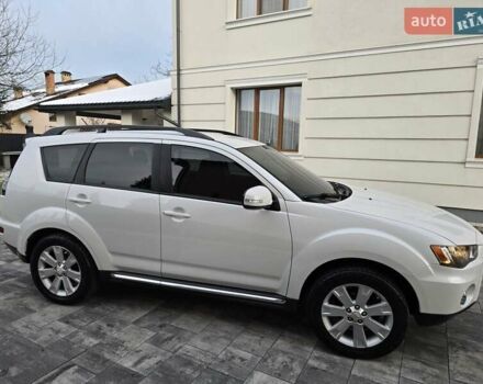 Білий Міцубісі Аутлендер, об'ємом двигуна 2.36 л та пробігом 178 тис. км за 10200 $, фото 9 на Automoto.ua