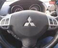 Белый Мицубиси Аутлендер, объемом двигателя 2.4 л и пробегом 157 тыс. км за 11000 $, фото 25 на Automoto.ua