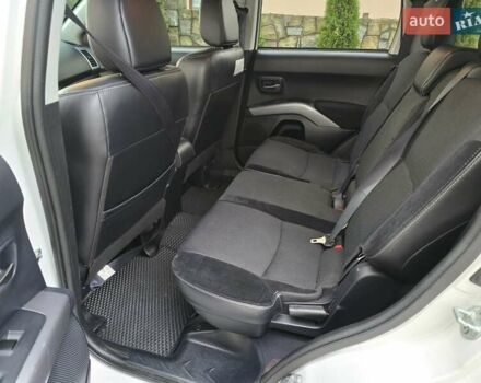 Білий Міцубісі Аутлендер, об'ємом двигуна 2.36 л та пробігом 178 тис. км за 10200 $, фото 26 на Automoto.ua