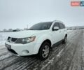 Белый Мицубиси Аутлендер, объемом двигателя 2 л и пробегом 145 тыс. км за 3399 $, фото 1 на Automoto.ua