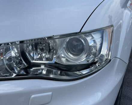 Білий Міцубісі Аутлендер, об'ємом двигуна 2.18 л та пробігом 198 тис. км за 11500 $, фото 19 на Automoto.ua