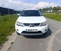 Белый Мицубиси Аутлендер, объемом двигателя 2 л и пробегом 170 тыс. км за 2869 $, фото 1 на Automoto.ua