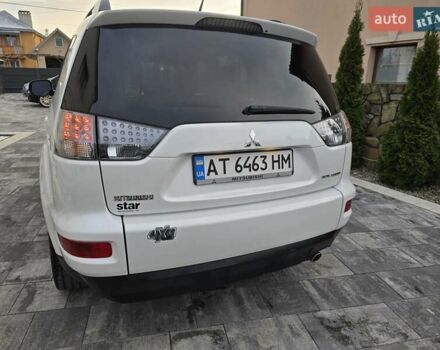 Білий Міцубісі Аутлендер, об'ємом двигуна 2.36 л та пробігом 178 тис. км за 10200 $, фото 6 на Automoto.ua