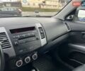 Білий Міцубісі Аутлендер, об'ємом двигуна 2.2 л та пробігом 245 тис. км за 10300 $, фото 3 на Automoto.ua