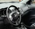 Білий Міцубісі Аутлендер, об'ємом двигуна 2.4 л та пробігом 250 тис. км за 10000 $, фото 4 на Automoto.ua