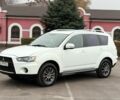 Білий Міцубісі Аутлендер, об'ємом двигуна 2.4 л та пробігом 250 тис. км за 10000 $, фото 1 на Automoto.ua