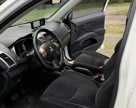 Белый Мицубиси Аутлендер, объемом двигателя 2 л и пробегом 172 тыс. км за 10999 $, фото 28 на Automoto.ua