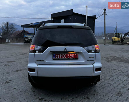 Белый Мицубиси Аутлендер, объемом двигателя 2.3 л и пробегом 161 тыс. км за 11150 $, фото 19 на Automoto.ua