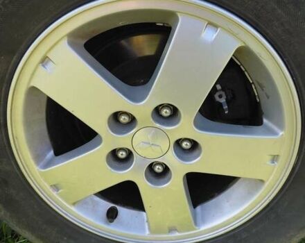 Білий Міцубісі Аутлендер, об'ємом двигуна 2.3 л та пробігом 288 тис. км за 12000 $, фото 10 на Automoto.ua