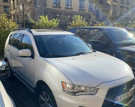 Белый Мицубиси Аутлендер, объемом двигателя 2.4 л и пробегом 154 тыс. км за 12500 $, фото 2 на Automoto.ua