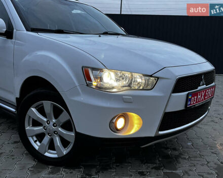 Белый Мицубиси Аутлендер, объемом двигателя 2.3 л и пробегом 161 тыс. км за 11150 $, фото 5 на Automoto.ua