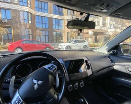 Белый Мицубиси Аутлендер, объемом двигателя 2.4 л и пробегом 154 тыс. км за 12500 $, фото 14 на Automoto.ua