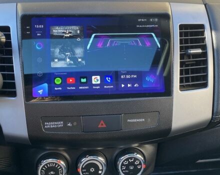 Белый Мицубиси Аутлендер, объемом двигателя 2.4 л и пробегом 154 тыс. км за 12500 $, фото 16 на Automoto.ua