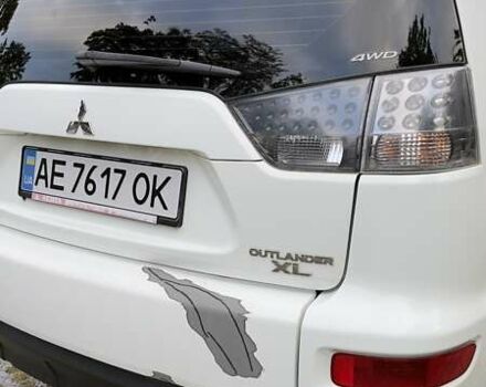 Белый Мицубиси Аутлендер, объемом двигателя 2 л и пробегом 172 тыс. км за 10999 $, фото 5 на Automoto.ua